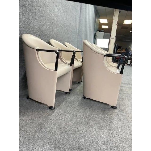 Elevate your dining room or design space with this exceptional set of five signed Italian postmodern armchairs by Luigi...
