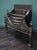 An elegant 19th century Wwought & cast fire grate in the earlier Neo-Classical Manner. A semi-circular fire basket with...