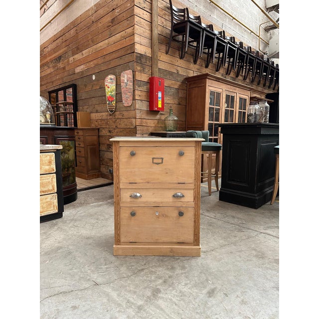 This small poplar wood cabinet has been completely restored. It consists of two doors opening onto storage spaces and a...