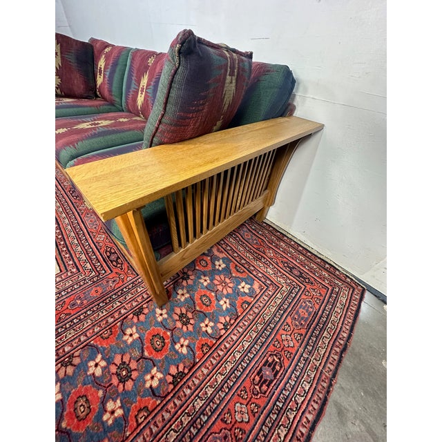 Rooted in the tradition of American Arts and Crafts design, this Mission-style Bassett couch beautifully blends enduring...