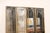 A French mid-century antiqued glass and gold folding screen, circa 1950's. This vintage room divider from France features...