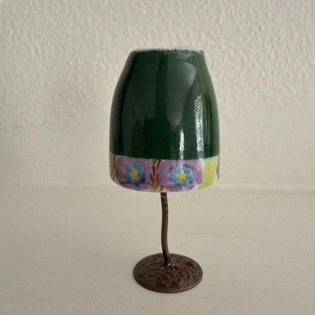 The Lovely Limogé Gardening Mannequin Trinket Box is a charming collectible piece that doubles as a trinket box. This two-...