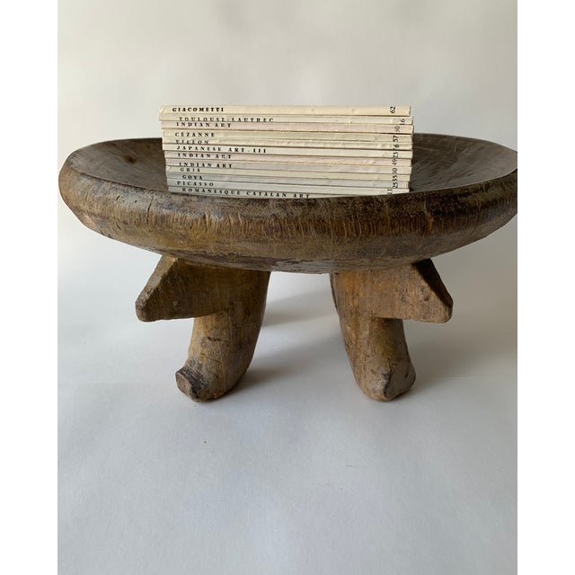 Vintage African Mini Stool/Plate Beautifully handcrafted from a single piece of wood, with incredible sculptural and...