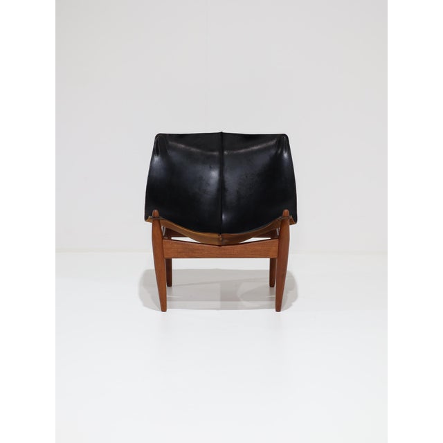 A very rare model 272 easy chair designed by illum wikkelsø in denmark during the 1960s. This beautiful chair is crafted...