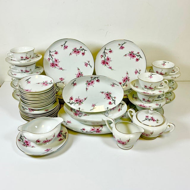 This set of 56 pieces of Japanese’s Porcelain Dinnerware is from the 1940s. The pattern is Cherry Blossom by Diamond China...