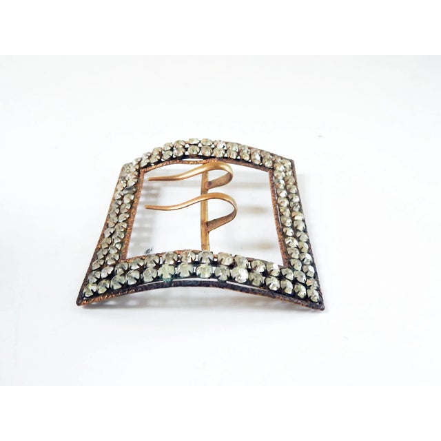 Antique circa 1890's gilt brass with rhinestones belt or sash buckle. Two rows of prong set stones in a brass framework,...