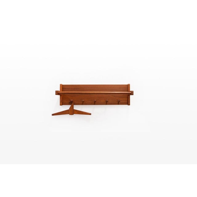 Danish vintage coat rack by Aksel Kjersgaard. The coat rack is made of teak wood. It can be easily mounted on the wall and...