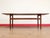 Discover a gorgeous mid century coffee table that exemplifies the timeless elegance of Danish design, featuring a...