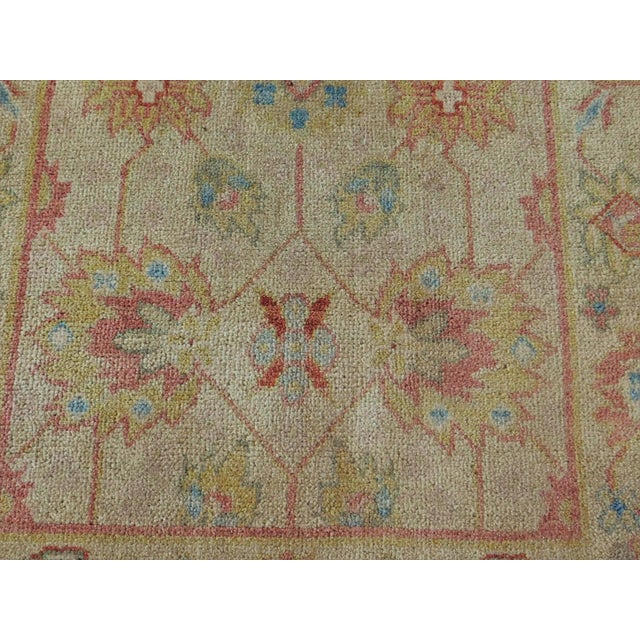 All over stylized flower on a beige background. 100 % pure wool pile. Handmade.