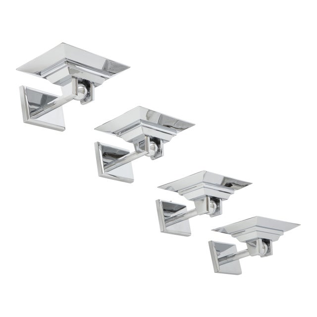 Beautifully executed heavy Minimalist polished chrome sconces by Boyd Lighting. There are 4 available and they are priced...