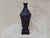Small open water vessel by oikos estudio x matter edit handmade dimensions: d 10 x w 10 x h 43 cm materials: clay and...