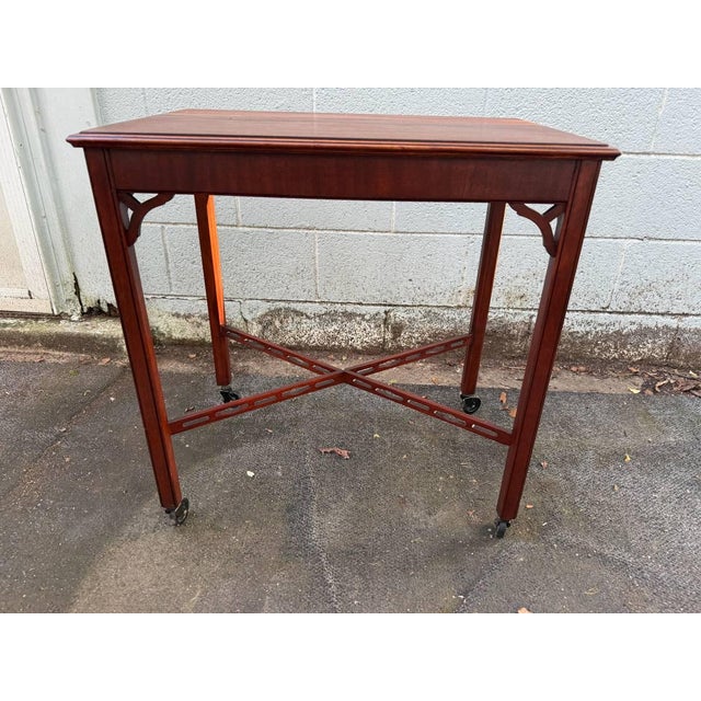 Vintage Georgian Style Chippendale Style Mahogany Tray Top Side Table. Solid wood frame, sturdy and it features straight...