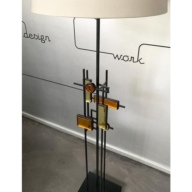 Floor mid-century table lamp. Design by svend aage holm sørensen, for holm sørensen, denmark. an iron structure made up of...