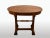 Splendid oval desk table veneered in walnut with double -parental legs linked by oval ray medallion, lathed swelling and...