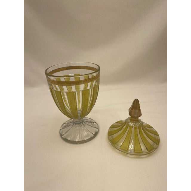 Unusual Heisey Candy Jar. Textured surface applied to the yellow colored ribs. I has the Heisey Diamond with H On bottom....