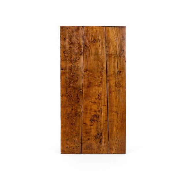 A small french side table in walnut with a charming central breadboard that extends from beneath the apron. The triple...