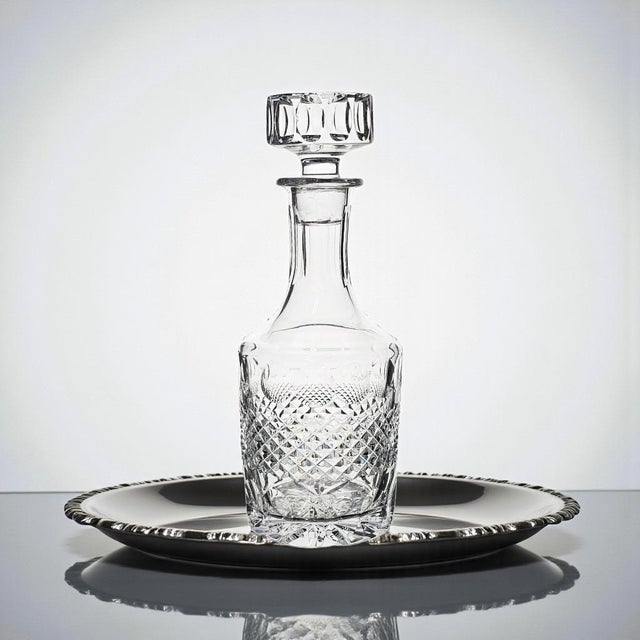 A finely executed Irish cut crystal whiskey decanter in the sought-after O’Malley pattern, distinguished by precise...