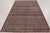 This vintage 6x10 Turkish rug is a striking hand-knotted wool weaving dating to circa 1950–1960. The piece features an...