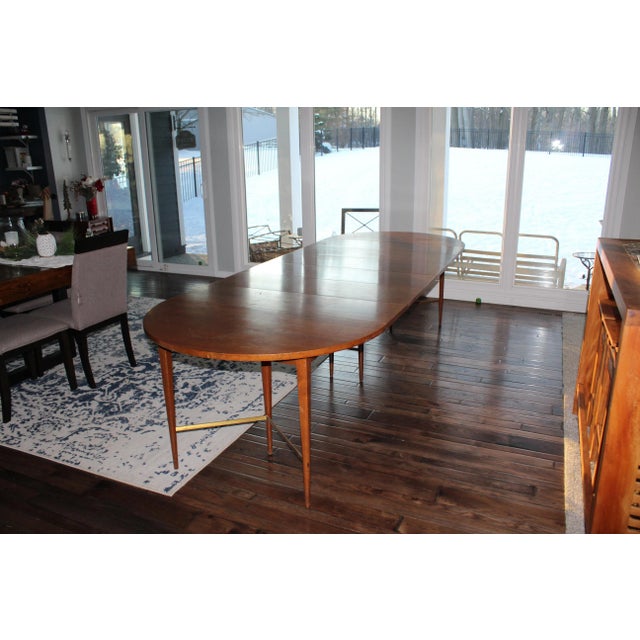 Mid Century Paul McCobb Dining Table with Extension This stunning vintage dining table is a true masterpiece of mid-...