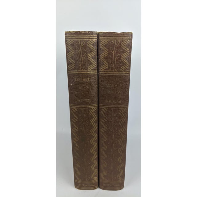 A beautifully coordinated pair of vintage Nathaniel Hawthorne classics from the New Wayside Edition, dated 1931. The set...