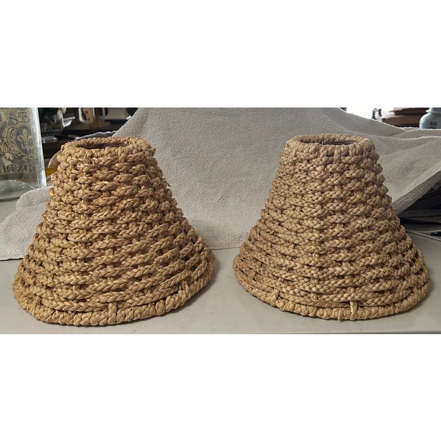 The perfect pair! Vintage handmade braided raffia/sea grass lampshades. Lined in a natural colored fabric so they will...