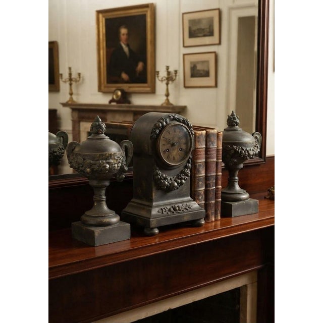A striking pair of vintage Ethan Allen Attributed neoclassical urn like sculptural pieces, each richly detailed with...