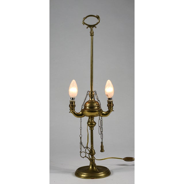 with New Electrical Light System. Very particular decorations on the handle. Category: antique Table lamp size: height 63...