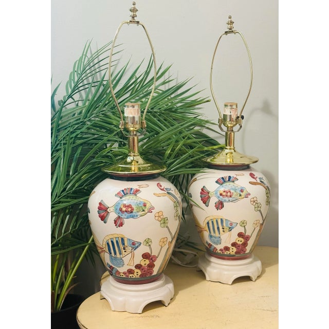 Fabulous set of Porcelain lamps hand painted with bright colors fish circa 1960s Great for the coastal design.