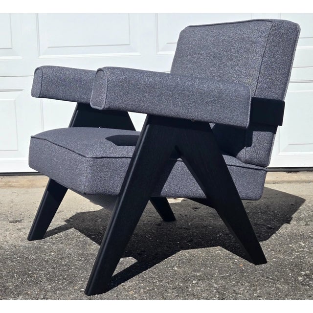 Outstanding Chandigarh lounge chair with graphite black Oak frame and grey fine boucle upholstery. Produced by Klarel in...