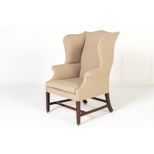 Large scale 18th century english mahogany wing chair a large scale 18th century english mahogany wing chair. with its deep...
