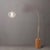 The Tambo Arc Lamp is a sophisticated lighting solution that blends modern design with a touch of classic elegance....
