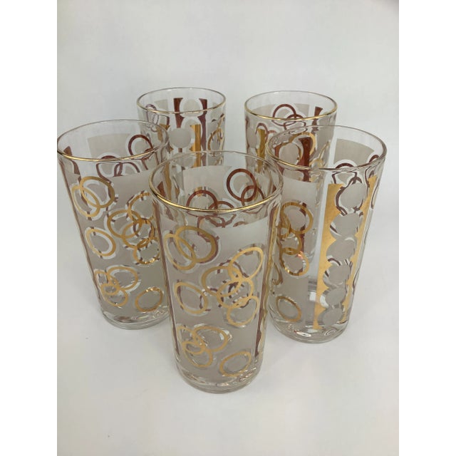 Set of 5 Vintage Highball Glasses With Gilt Interlocking Circles on Frosted Glass. 5 1/2" high x 2 3/4" across.
