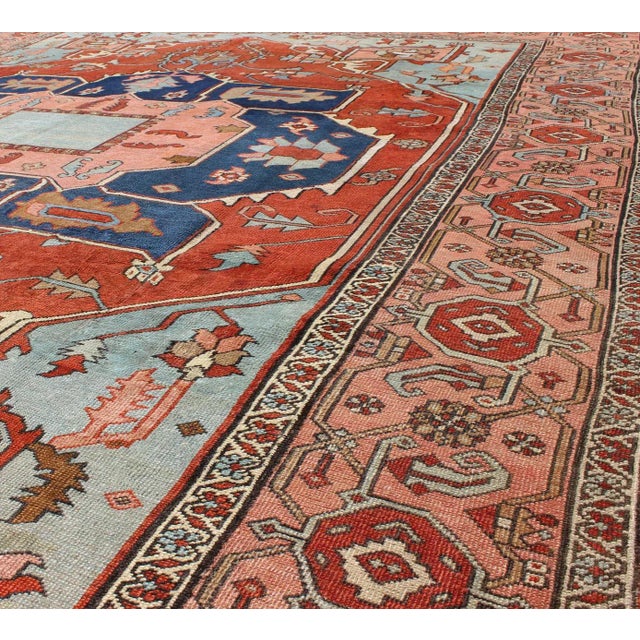 1900 - 1909 Antique Serapi Rug in Antique Red, Light Blue and Salmon Colors For Sale - Image 5 of 11