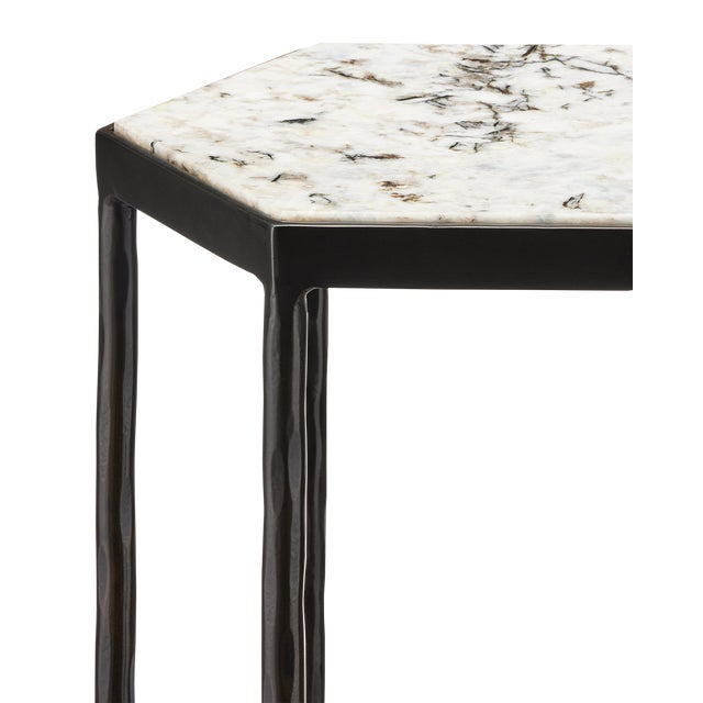 The Tosi Marble Accent Table is a slender, tall black accent table with lines that are both clean and a bit wavy. The dark...