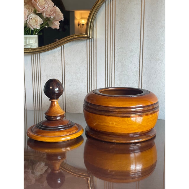 Antique lidded tobacco jar from the 19th-century. Also known as a Dutch Treen vessel, it dates back to around 1840. It...