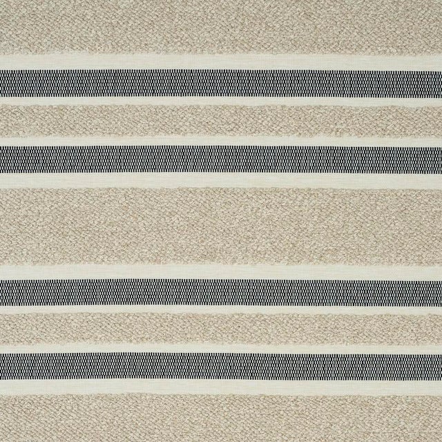This next-gen indoor-outdoor fabric is a woven stripe that marries durability with the decadent look and feel of a boucle....