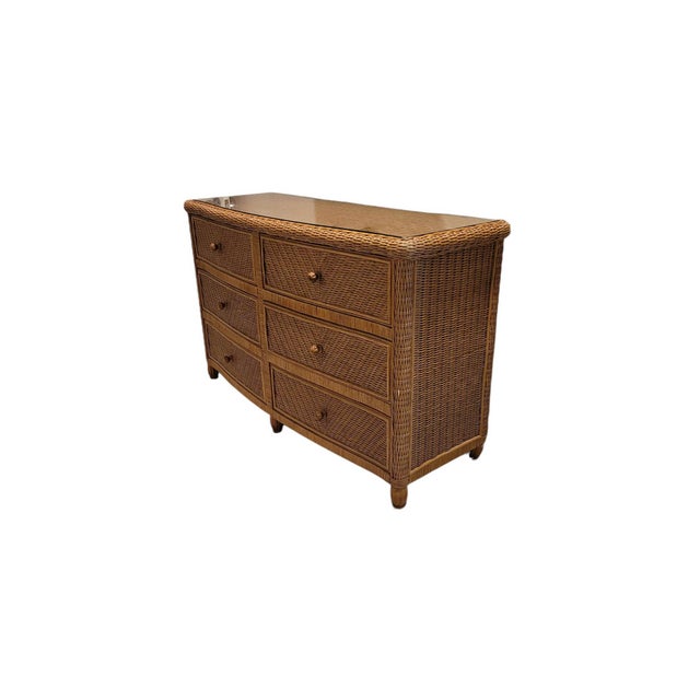 A graceful late-20th-century Palm Beach Regency six-drawer double dresser, crafted with an elegant convex bowfront...