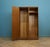 A freestanding double door teak wardrobe from Stag for the Cantata range - designed by John and Sylvia Reid. Made during...