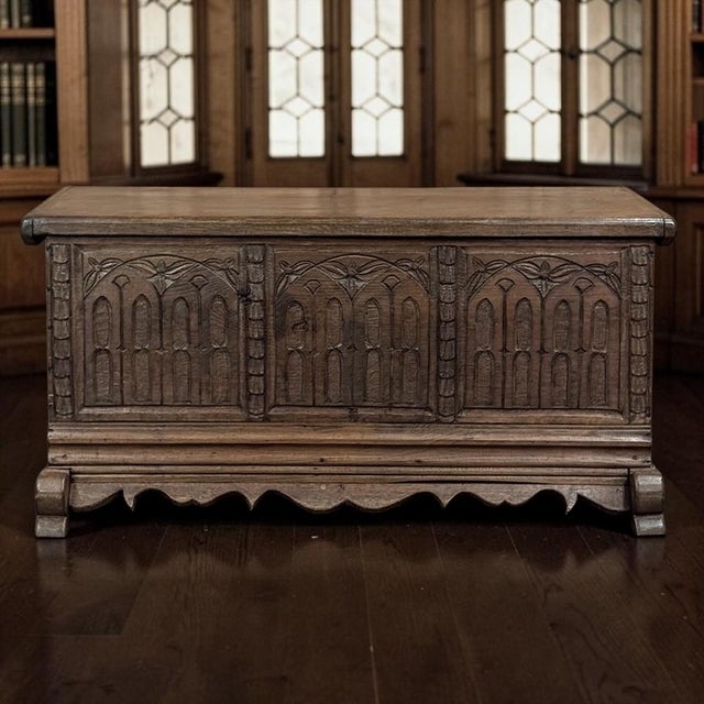 Evoking the carved chests once placed within medieval halls, ecclesiastical interiors, and great country houses, this 19th...