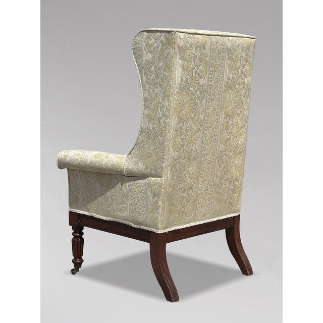 A handsome late georgian william iv mahogany high-back wing armchair a superb late georgian, early william iv period high-...