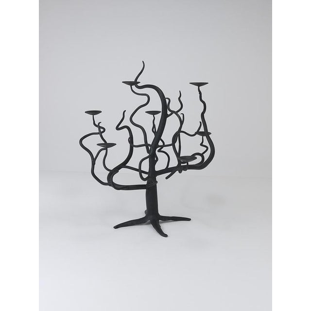 A beautiful Brutalist tree candle holder / candlestick from the 1970s. Hand-forged from blackened wrought iron and...