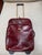 Design Plus Gallery presents a Maroon Leather Trolley Luggage Piece of Embossed Printed Crocodile. A staple for any well-...