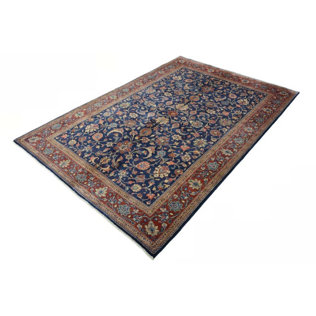 This magnificent hand-knotted Sarough oriental rug is a prime example of classic rug art - elegant, rich in floral details...