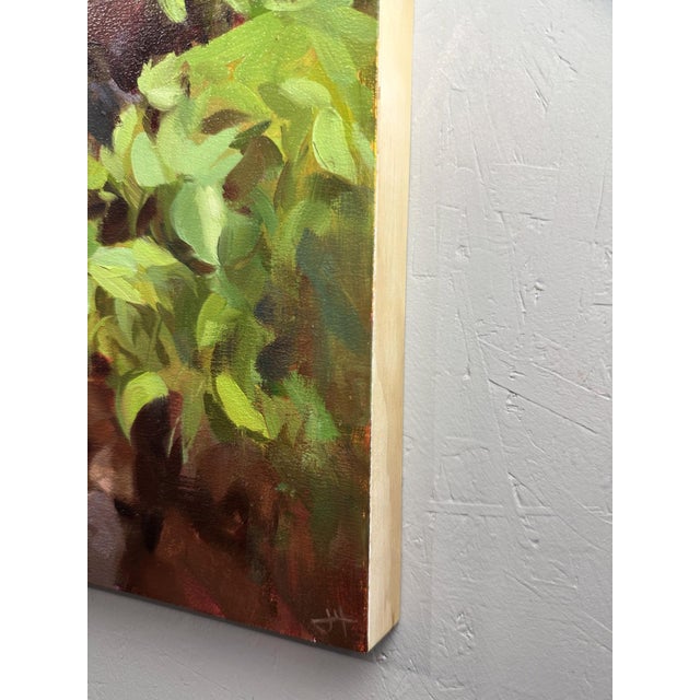 This oil painting captures a serene stream cascading over smooth stones, surrounded by lush greenery and vibrant foliage....