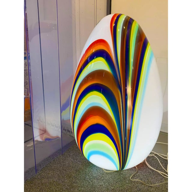 Contemporary White egg lamp in Murano glass with multicolored reeds fused together. Glass rods create spectacular and...