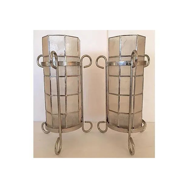 Elegant pair of capiz shell and metal, hurricane lantern candle holders. Excellent vintage condition. Dimensions below are...