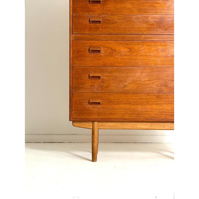 Børge Mogensen Model 135 Tallboy by Søborg Møbelfabrik A rare and elegant teak tallboy designed by Børge Mogensen and...