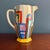 A fantastic example of the classic Athens shape jug, presented here in size at 7.25 inches tall. This piece features a...