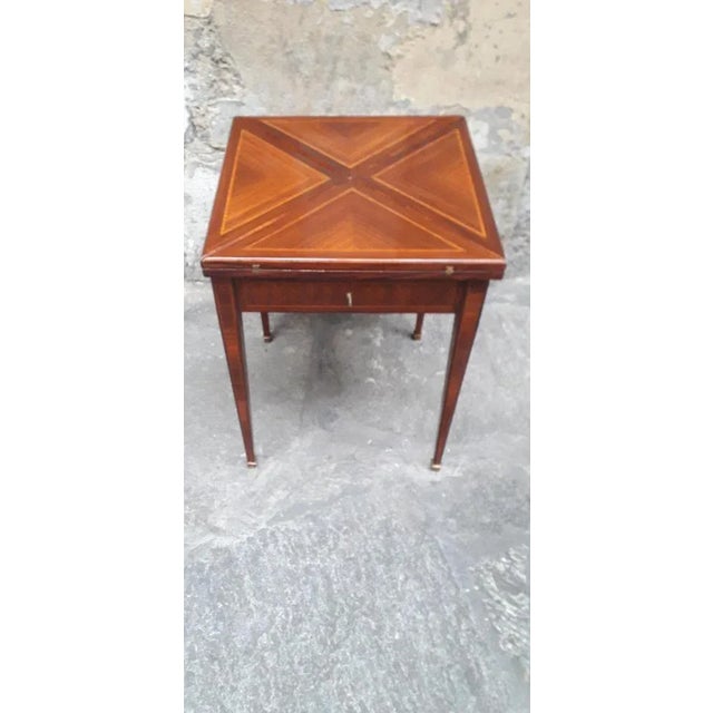 Game table Louis XVI style of great quality French manufacture, construction era second half 1800 (Napoleon III) The table...