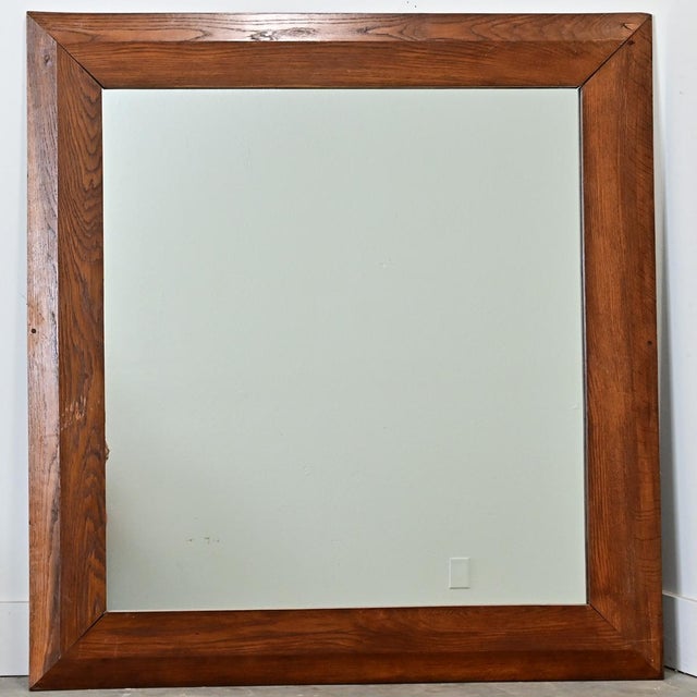 French vintage oak picture frame that has been fitted with a new plate of mirror glass for a clear reflection of any room....